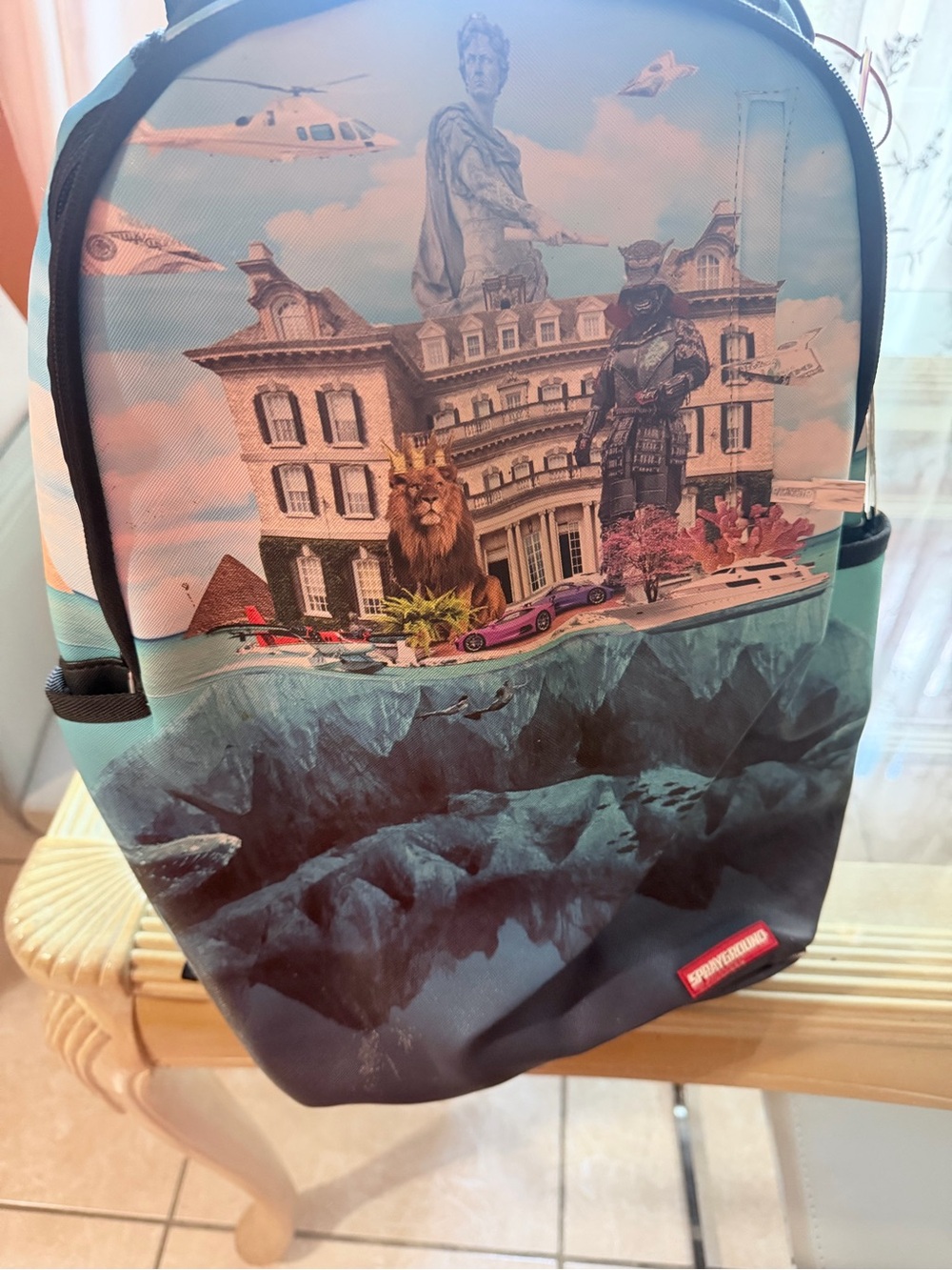 Sprayground Surreal Mansion Graphic Backpack Teal Blue Pink